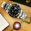 Rolex Submariner Date “Triple 0”.