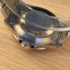 Rolex Submariner Date “Triple 0”.